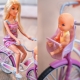 WOOPIE Lalka Mama Rowerzystka Bobas w Foteliku Rower