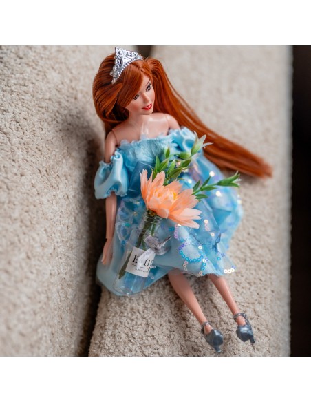 Emi doll in a blue dress - an elegant doll for girls Woopie