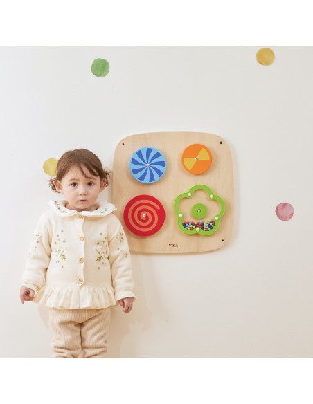 Wall panel with rotating discs and illusions for children – Viga
