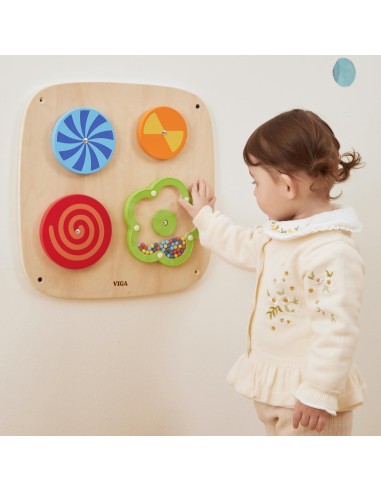 Wall panel with rotating discs and illusions for children – Viga
