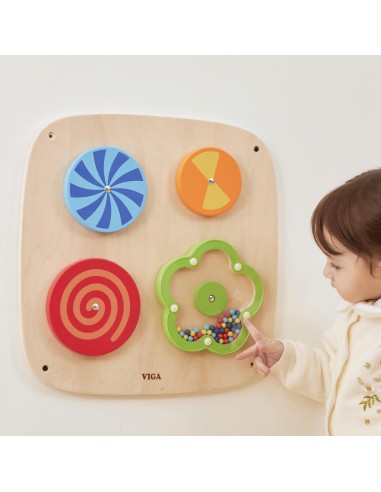 Wall panel with rotating discs and illusions for children – Viga