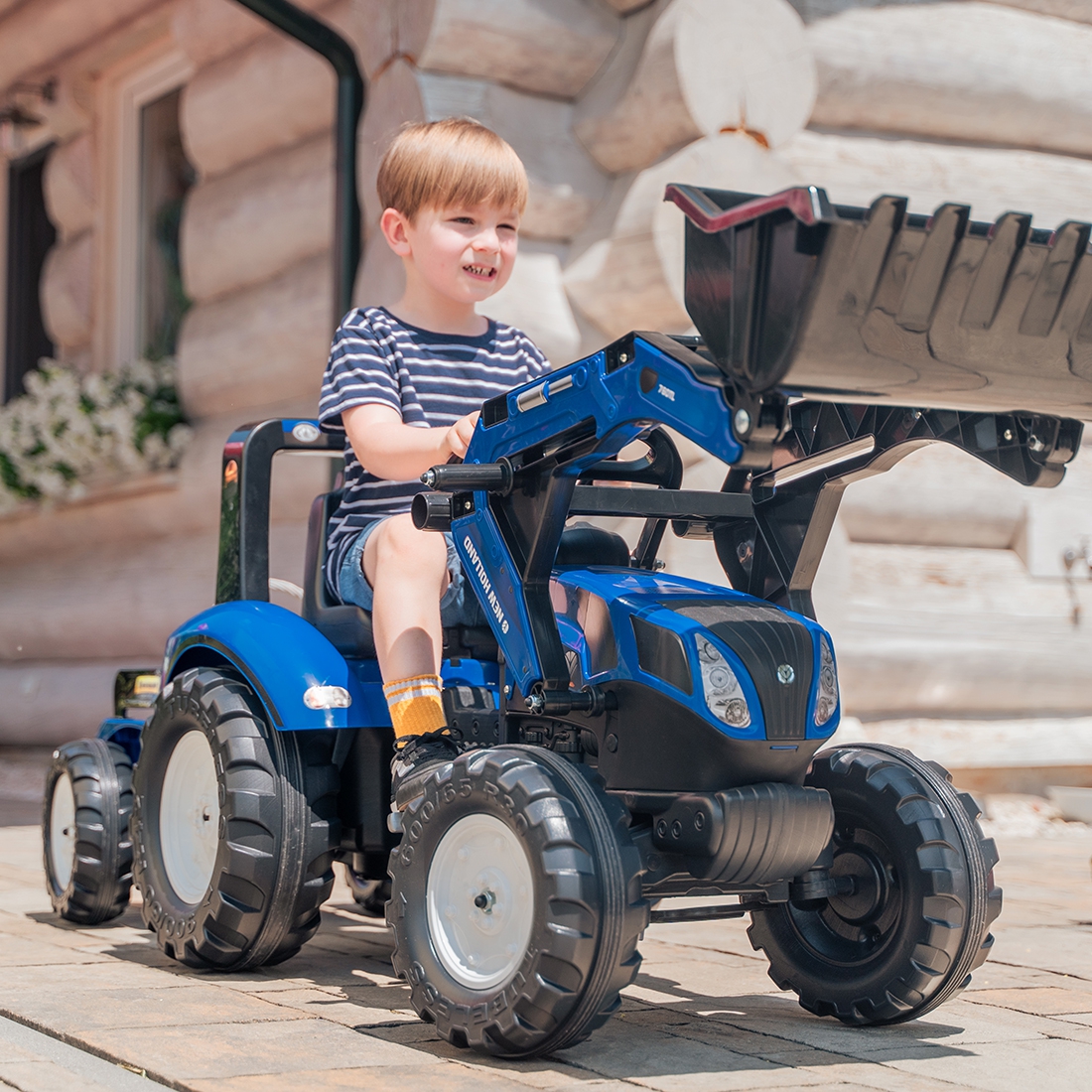 Traktor new holland niebieski na pedały z przyczepką od 3 lat