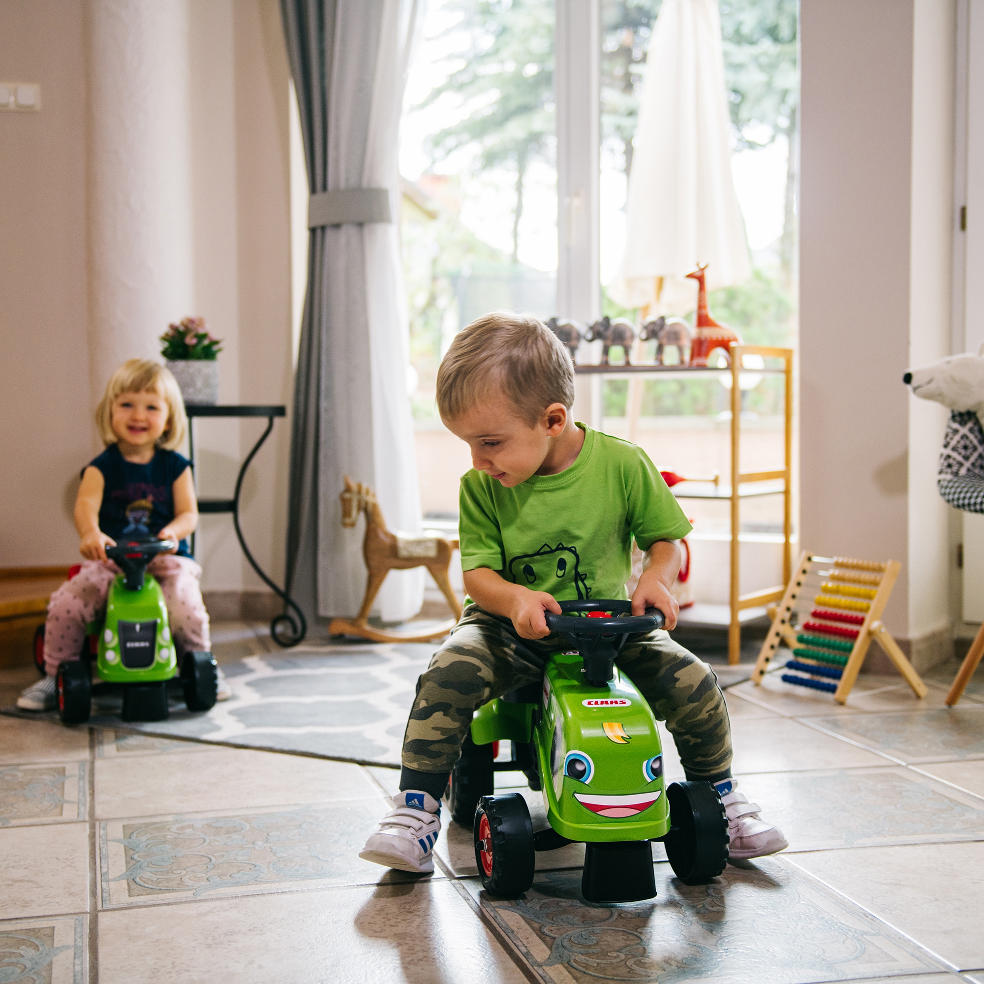 Traktorek baby claas zielony z przyczepką + akc. od 1 roku