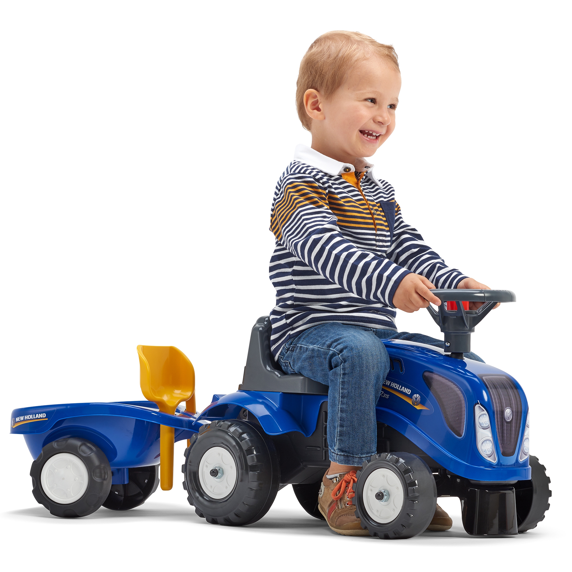 Traktorek baby new holland niebieski z przyczepką + akc. od 1 roku
