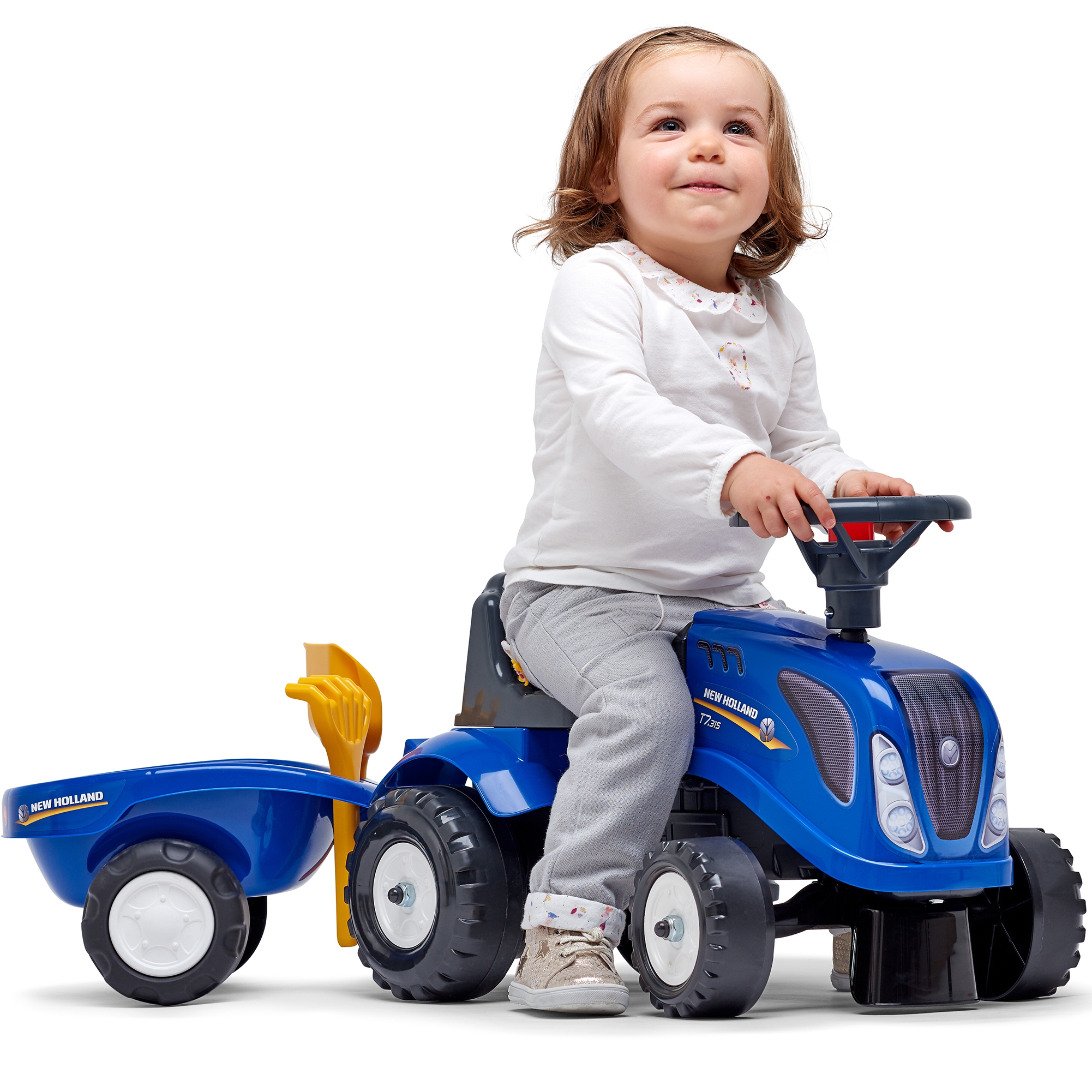 Traktorek baby new holland niebieski z przyczepką + akc. od 1 roku