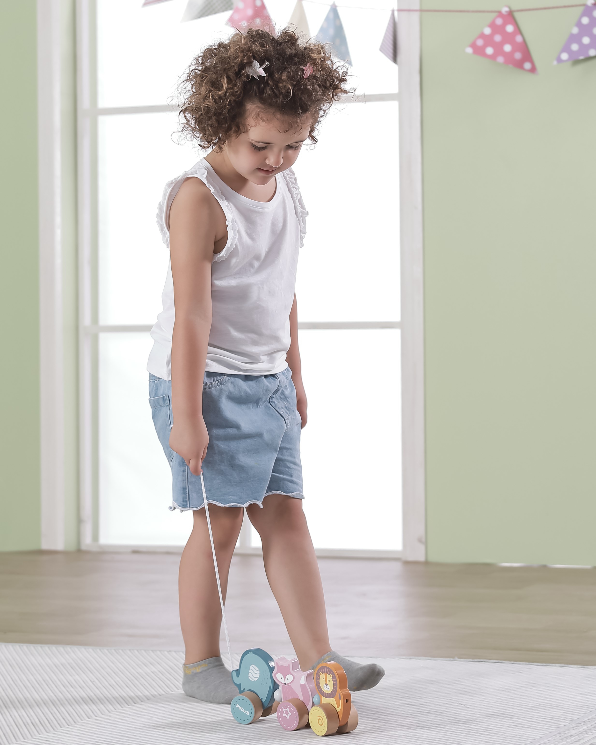 Drewniana zabawka zwierzątka do ciągnięcia montessori