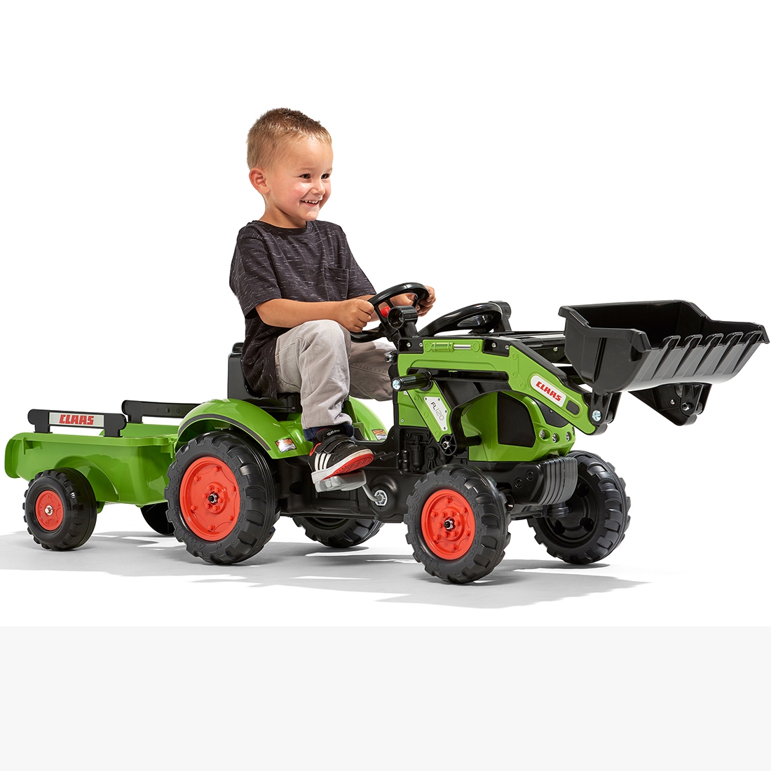 Traktor claas z przyczepą i łyżką na pedały