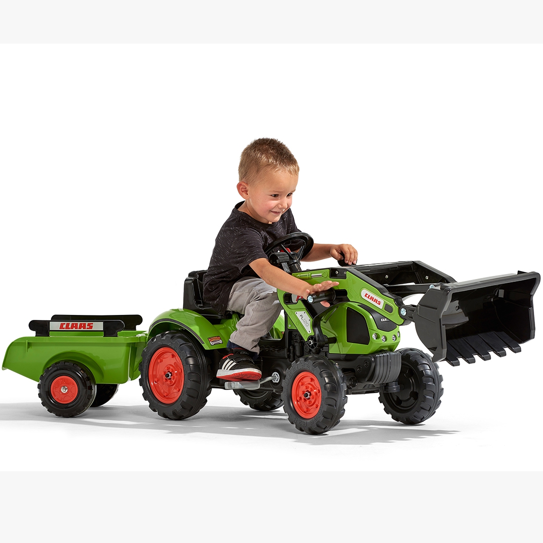 Traktor claas z przyczepą i łyżką na pedały