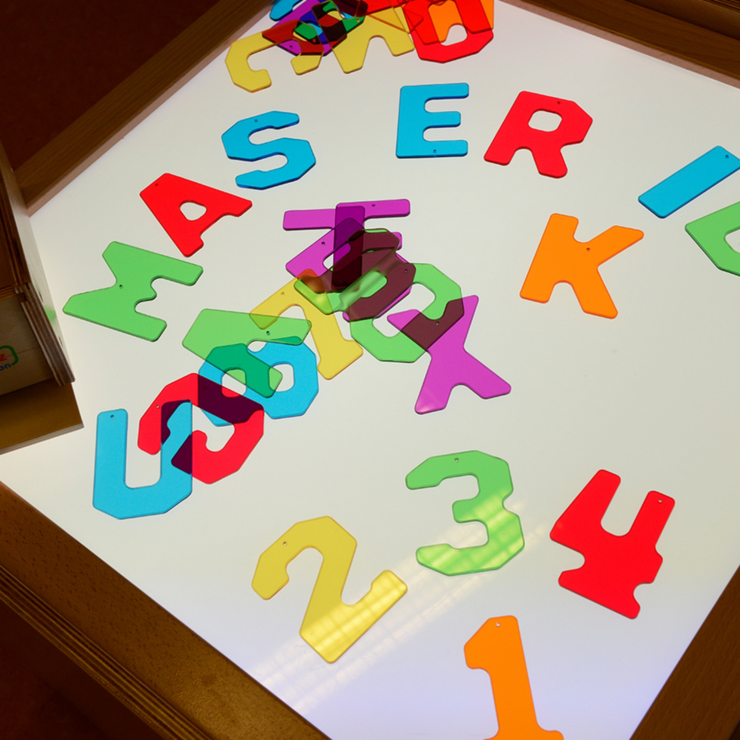 Przezroczyste cyfry i litery 38 szt. montessori