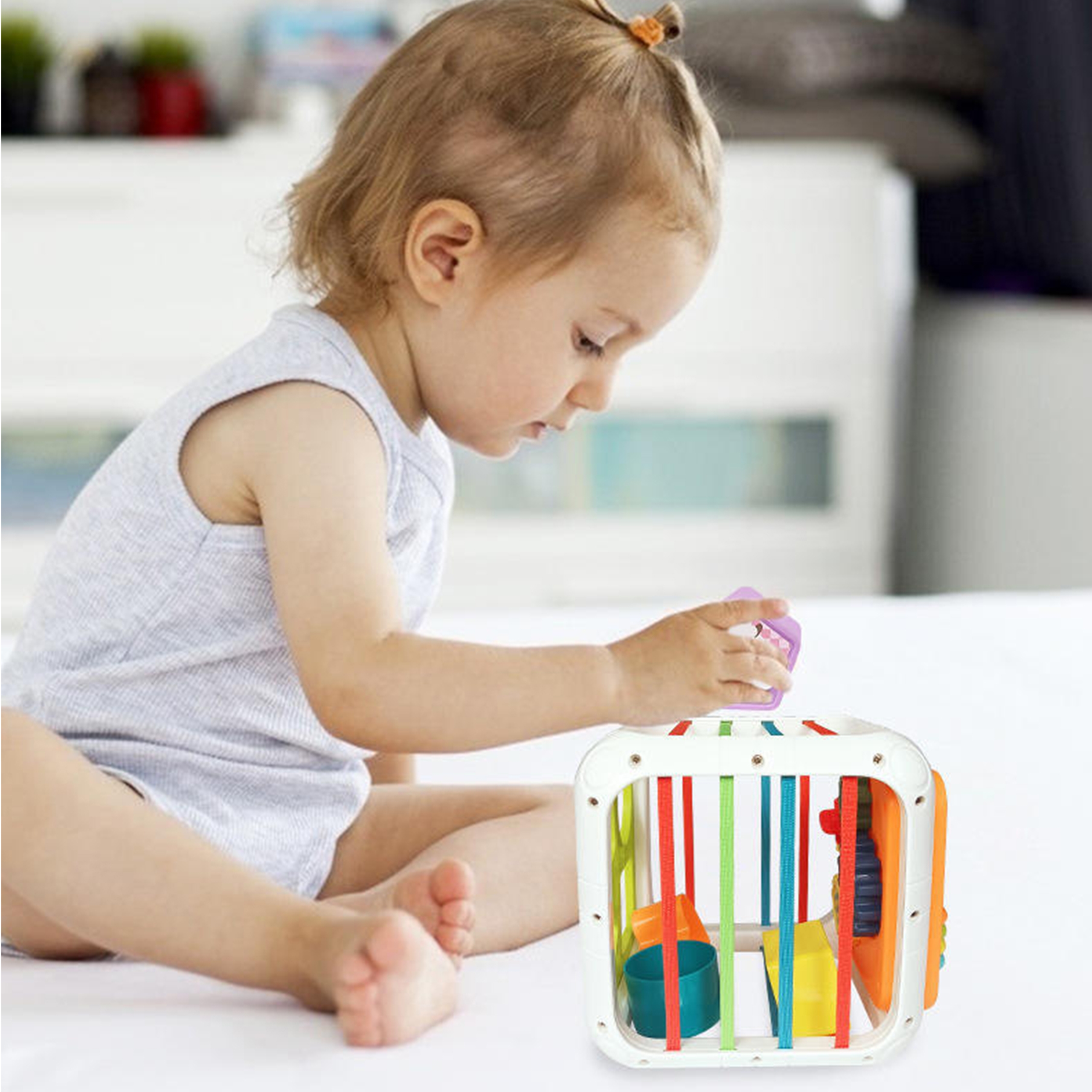 Kostka edukacyjna sorter 4w1 kształty 18m+